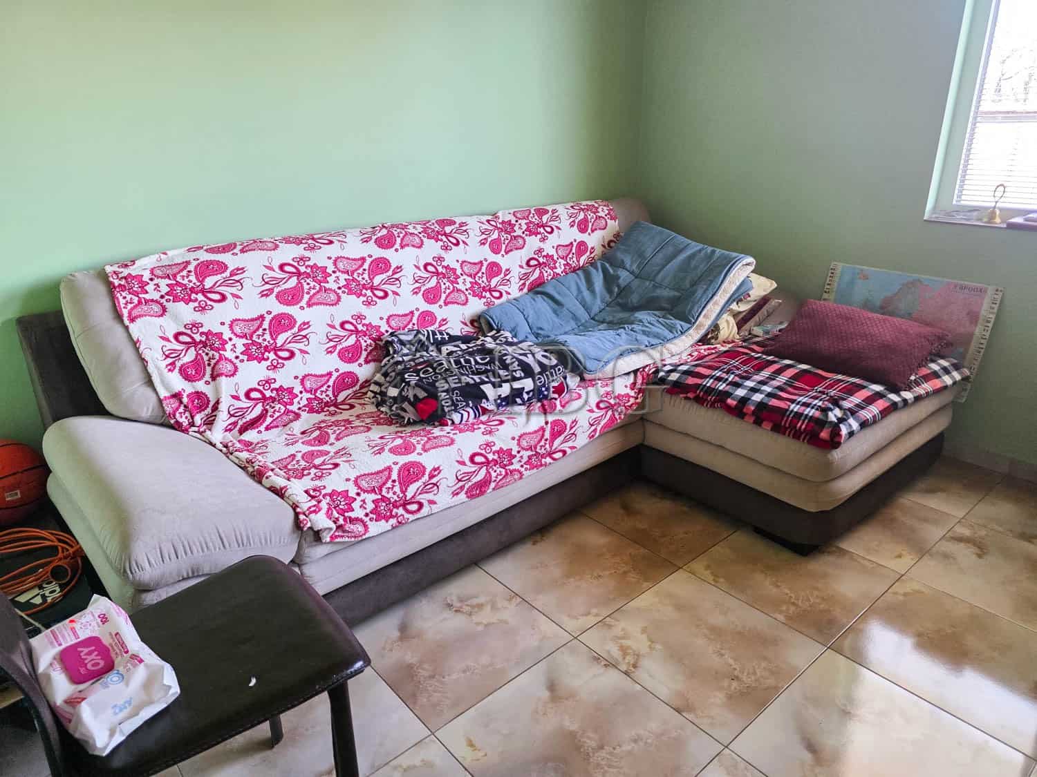 Comfortable living room with sofa and garden view near Sunny Beach.