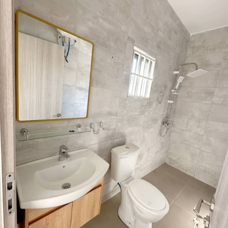 Villa bathroom with modern fixtures in Brufut Gardens, Gambia.