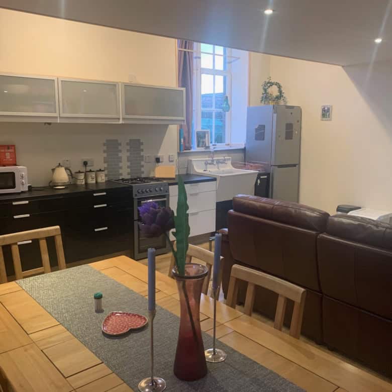 Interior view of a modern kitchen and living area in Mooncoin apartments, Kilkenny, Ireland.