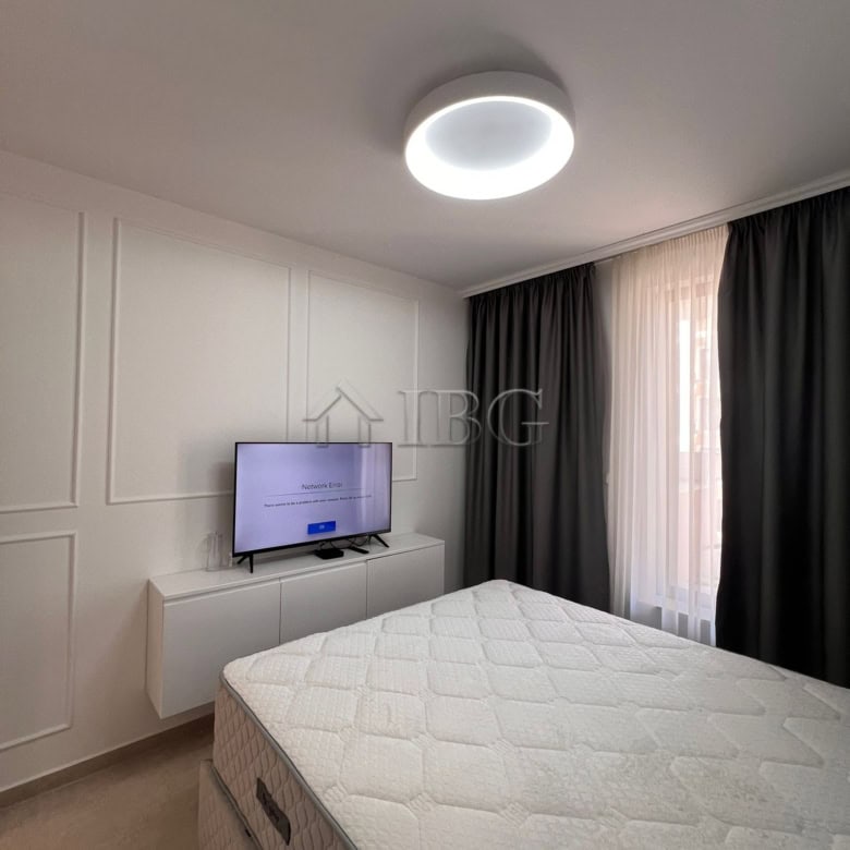 Cozy bedroom in a modern apartment overlooking the pool at Polar Star, Sveti Vlas.