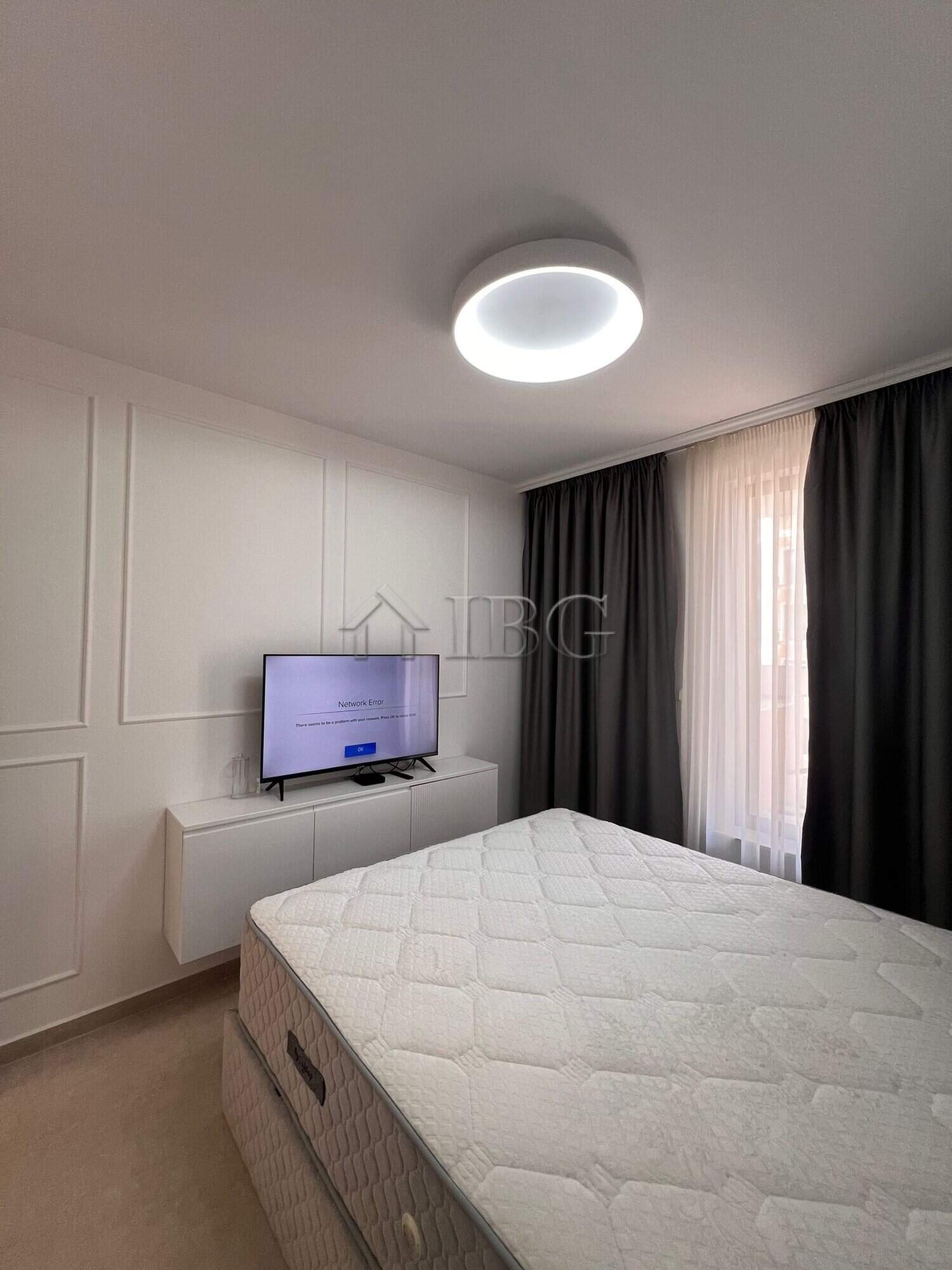 Cozy bedroom in a modern apartment overlooking the pool at Polar Star, Sveti Vlas.