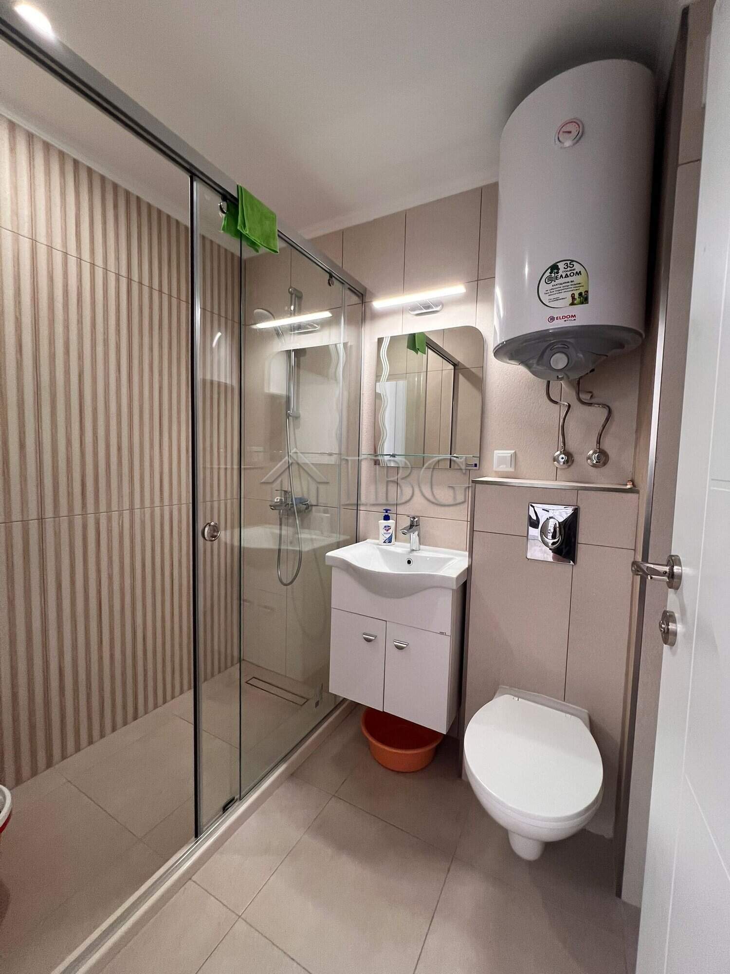 Compact bathroom with shower, sink, and toilet in Polar Star, Sveti Vlas.