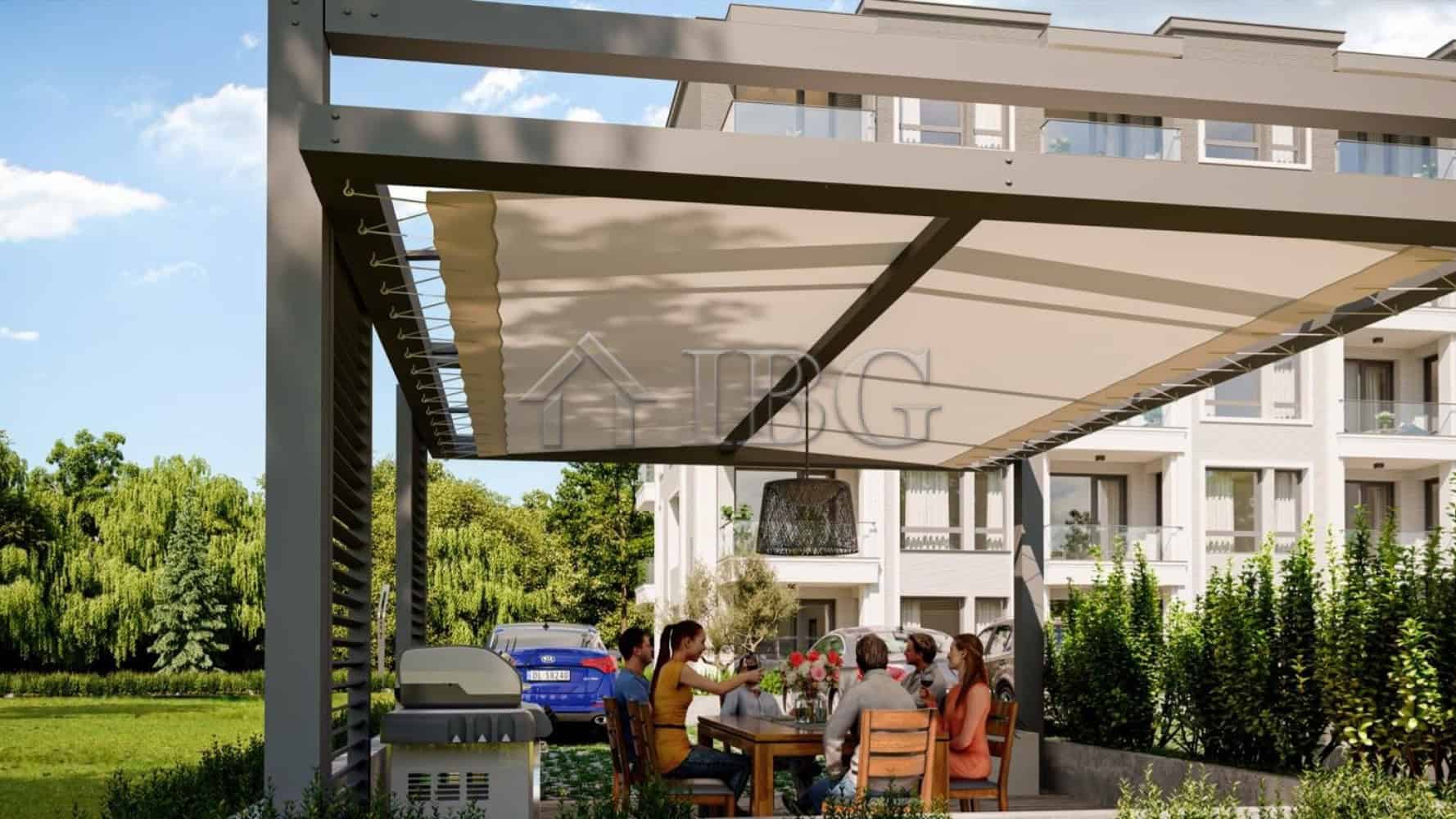 Modern apartment with shaded outdoor seating area in Ravda, near the beach.