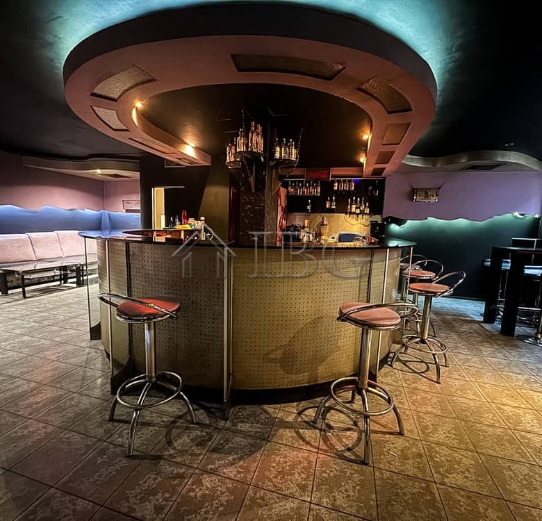 Modern bar area in prime commercial space for sale.