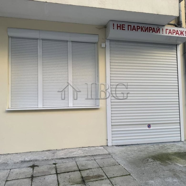 Garage door with warning sign in Lazur District, Burgas.