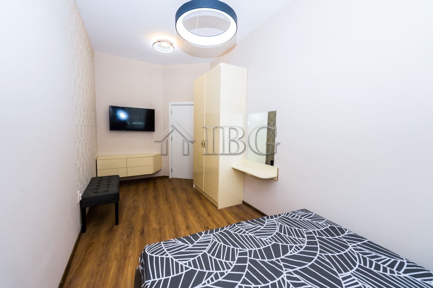 Bright interior of a luxury 1-bedroom apartment with modern furnishings and garage in Lazur District.