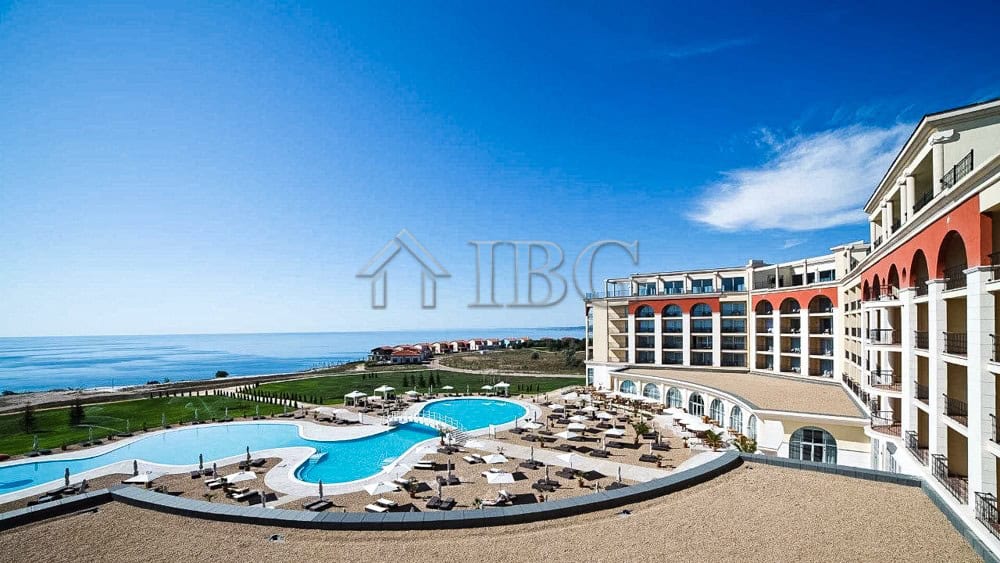 Modern 2-bedroom apartment overlooking the pool at Lighthouse Golf & Spa Resort.
