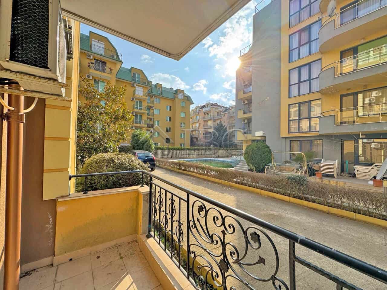 Balcony view of Sunny Beach apartments with modern design and outdoor space.