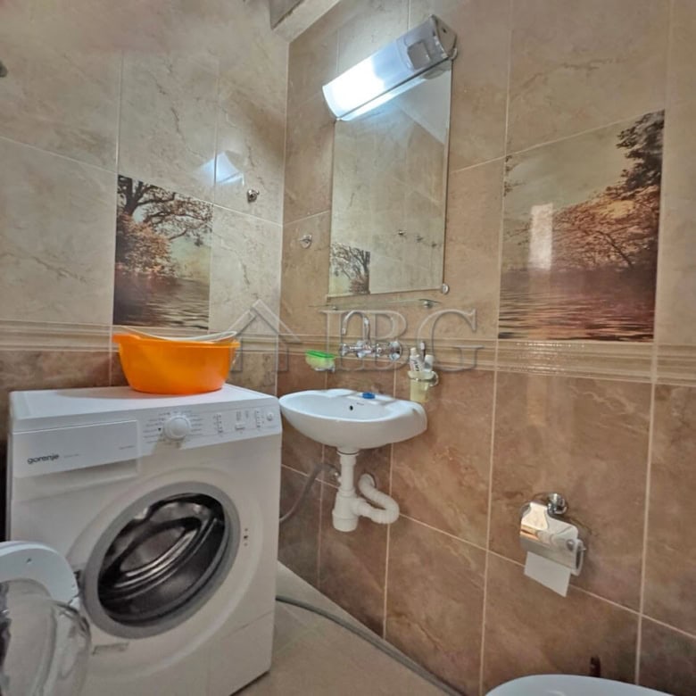 Bright studio apartment with balcony for sale in Sunny Beach, Bulgaria. Modern interior, compact des.