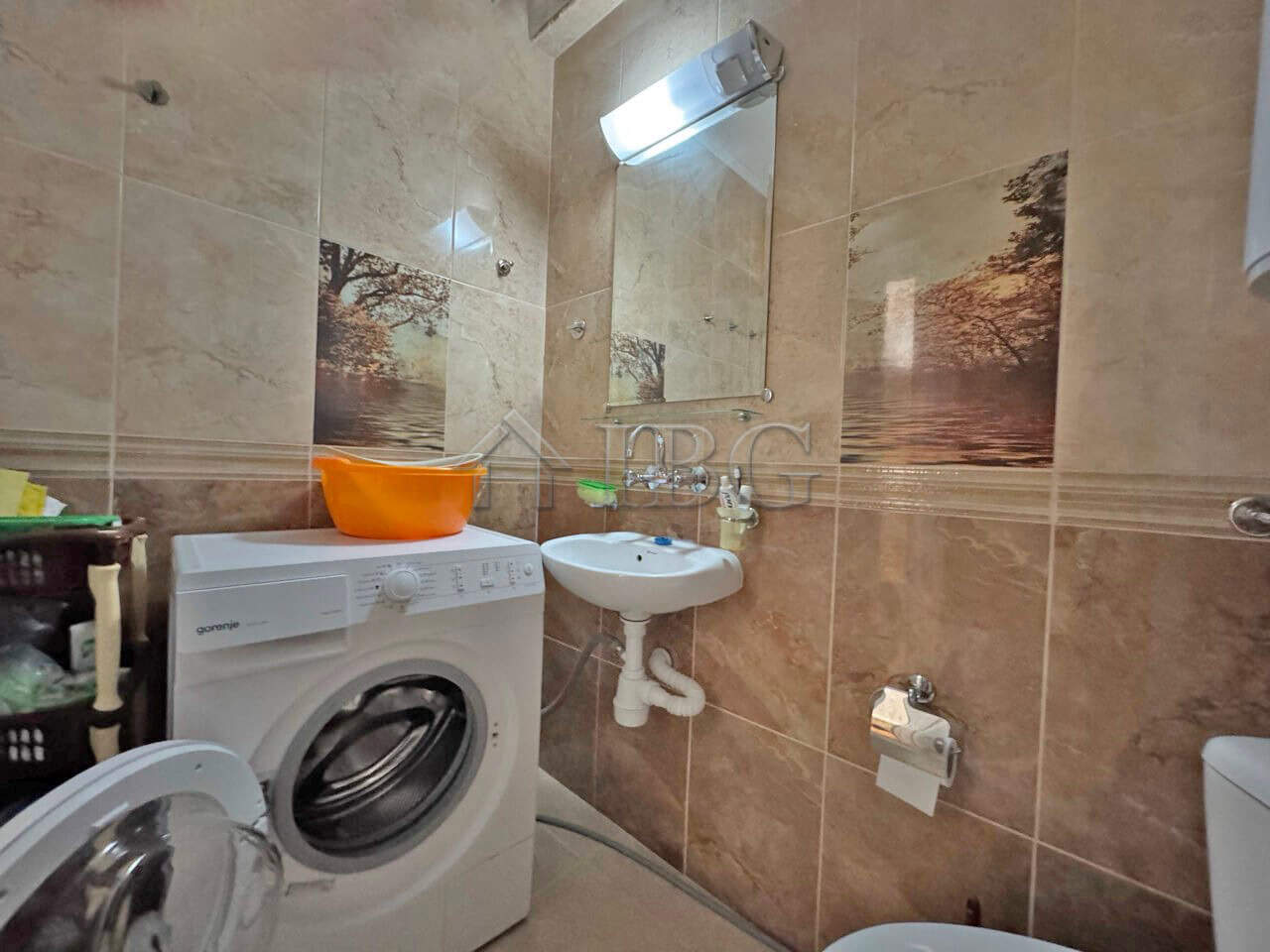 Bright studio apartment with balcony for sale in Sunny Beach, Bulgaria. Modern interior, compact des.