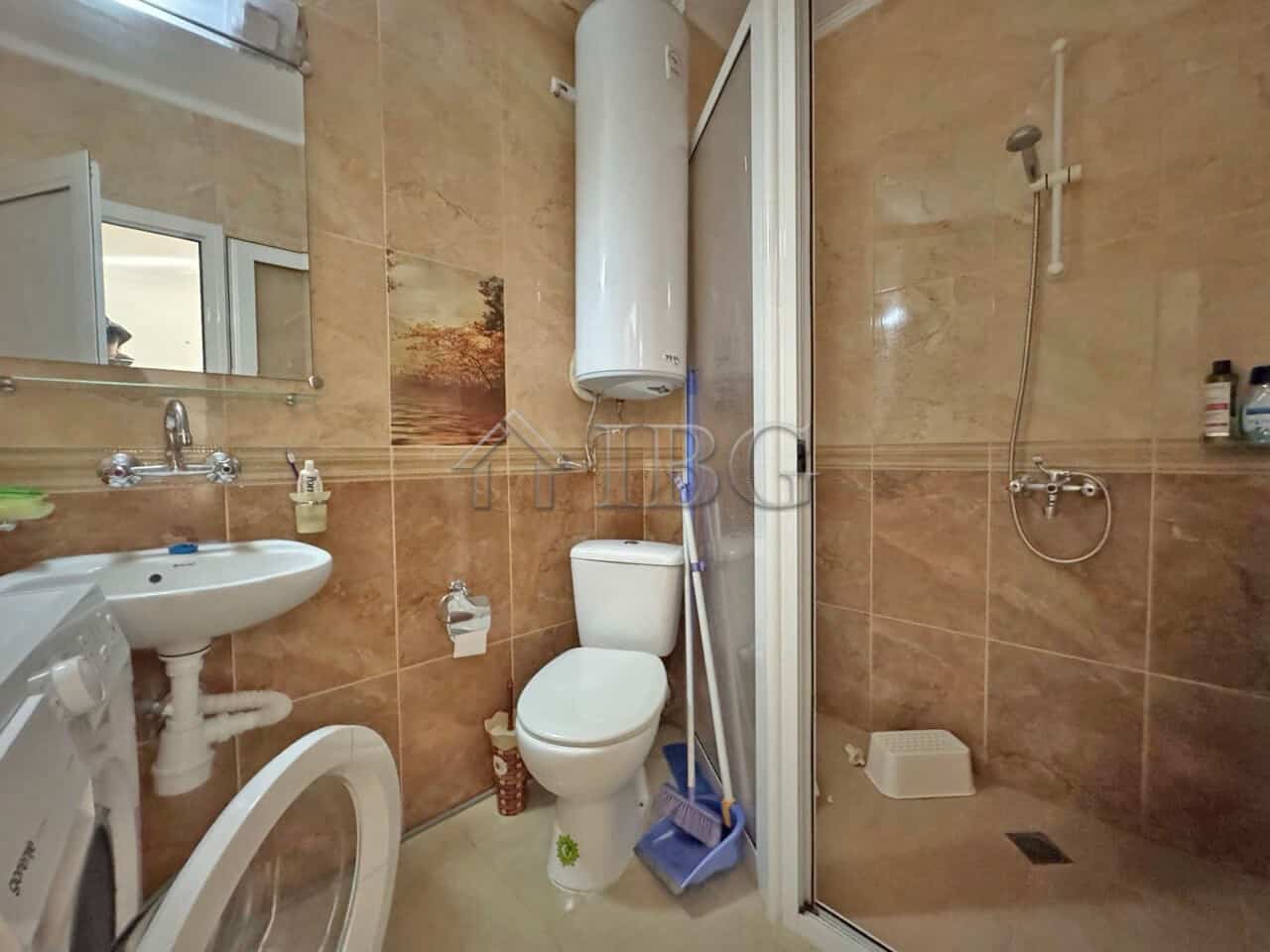Bright studio bathroom with shower and modern fixtures in Magnolia Residence 2, Sunny Beach.