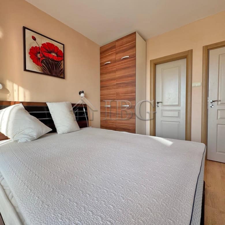 Interior view of a 2-bedroom apartment with pool view at Messembria Palace, Sunny Beach.