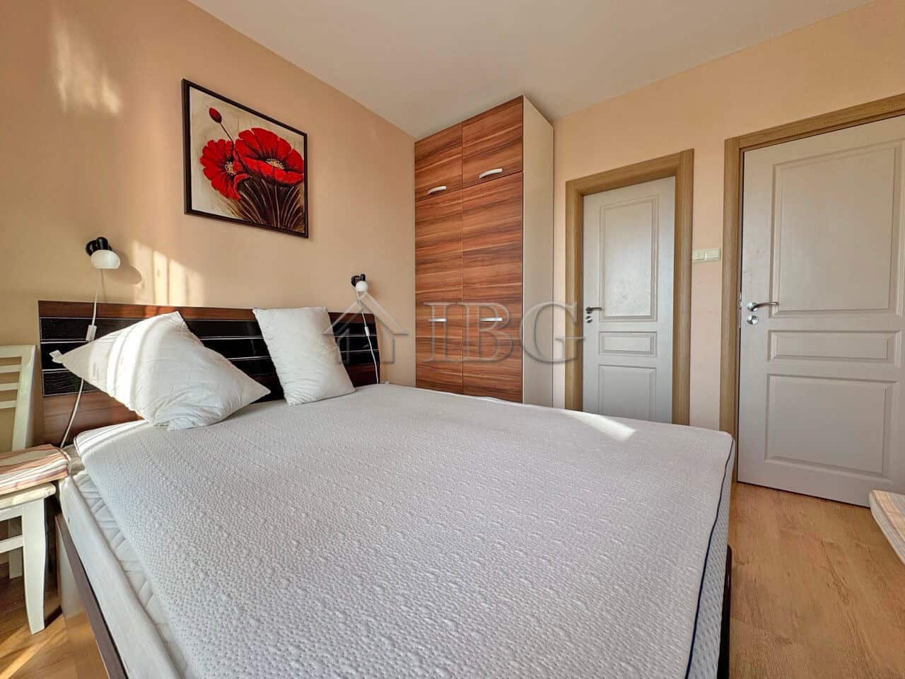 Interior view of a 2-bedroom apartment with pool view at Messembria Palace, Sunny Beach.