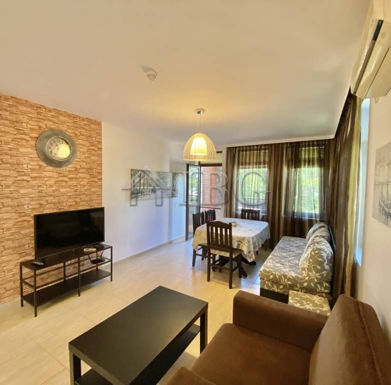 Bright living room with modern furnishings and large windows in Sveti Vlas.