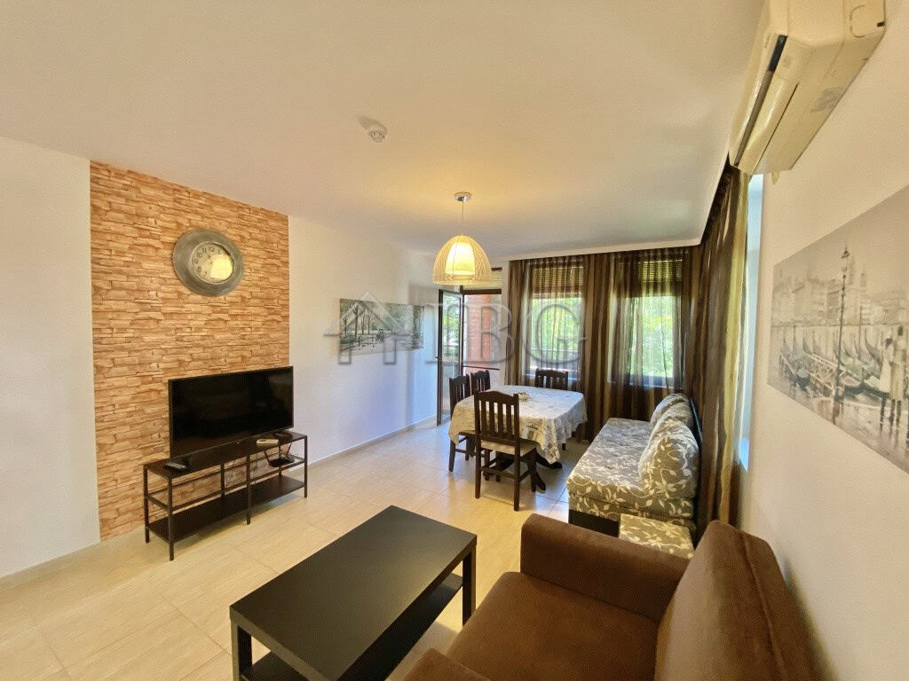 Bright living room with modern furnishings and large windows in Sveti Vlas.