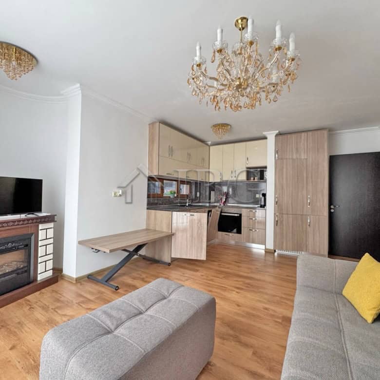 Modern 2-bedroom apartment with pool view in Sveti Vlas, Bulgaria, featuring a cozy living area, ful.