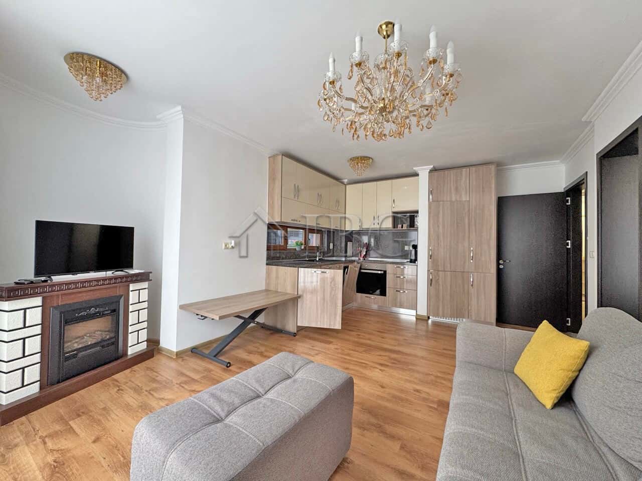 Modern 2-bedroom apartment with pool view in Sveti Vlas, Bulgaria, featuring a cozy living area, ful.