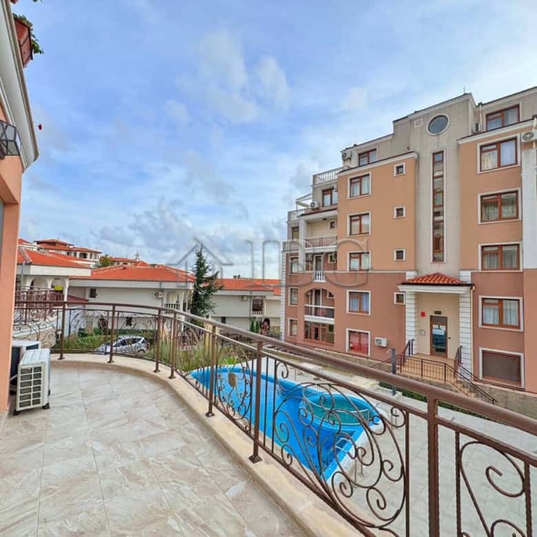 Pool view balcony of a 2-bedroom apartment in Sveti Vlas, Dinevi Resort.