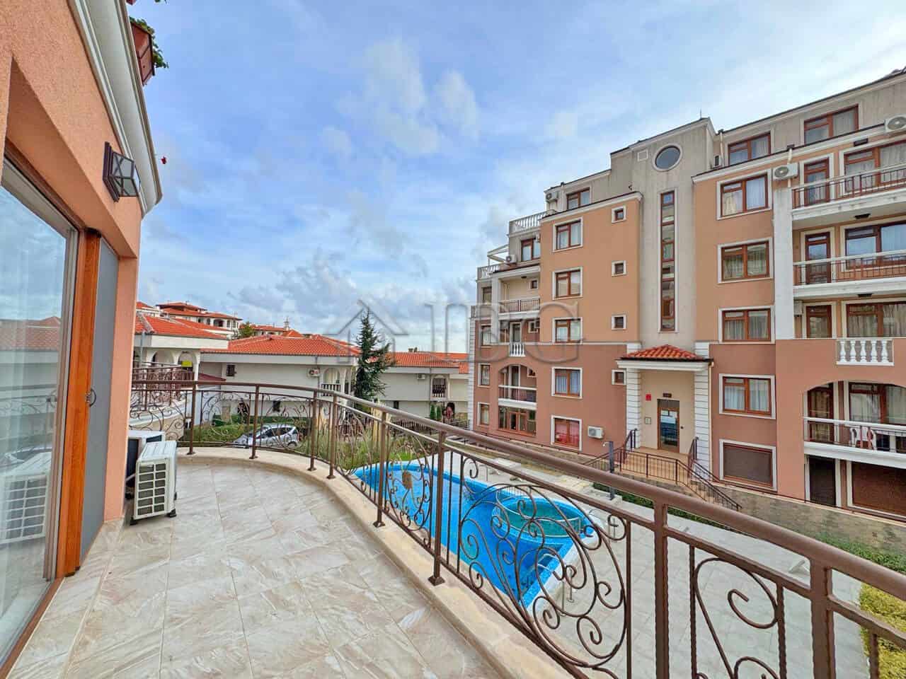 Pool view balcony of a 2-bedroom apartment in Sveti Vlas, Dinevi Resort.