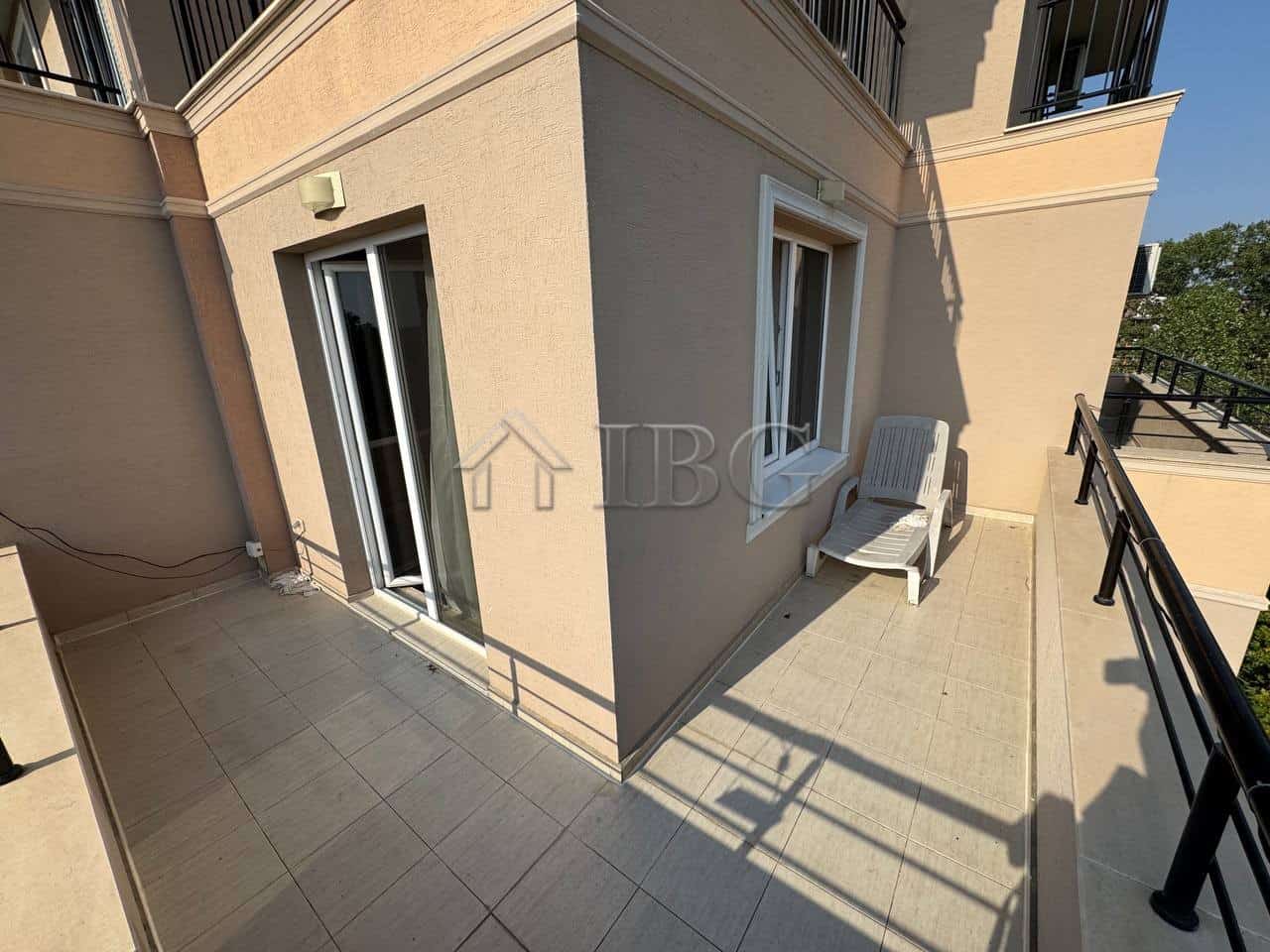 Balcony view of a maisonette apartment at VIP Zone Complex, Sunny Beach, with outdoor seating.