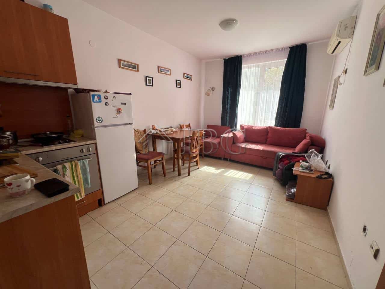 Bright living room with sofa and dining area in Sunny Day 3, Sunny Beach.