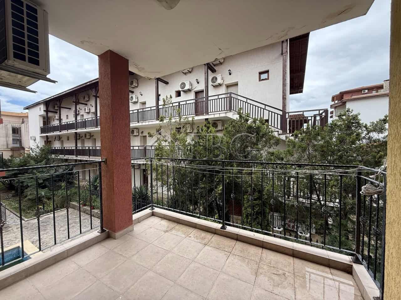 Balcony of a one-bedroom apartment in Tili Complex, Aurelia District, Nessebar, offering outdoor spa.