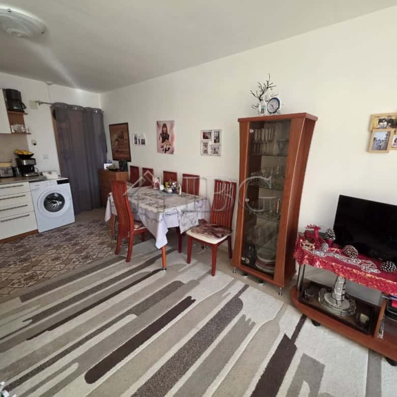 Spacious living room with dining area and modern kitchen in Ravda Sun & Sea Resort. Perfect for comf.