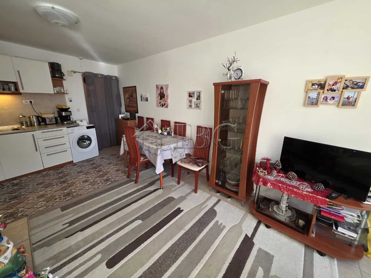 Spacious living room with dining area and modern kitchen in Ravda Sun & Sea Resort. Perfect for comf.