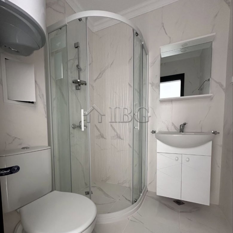Cozy studio apartment with sea view, patio, modern bathroom, and compact living space in Sveti Vlas.