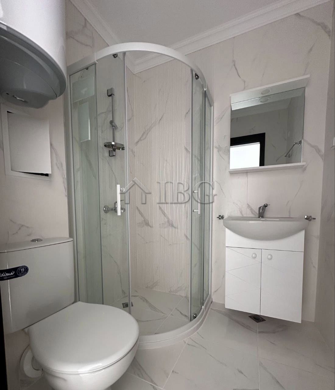 Cozy studio apartment with sea view, patio, modern bathroom, and compact living space in Sveti Vlas.