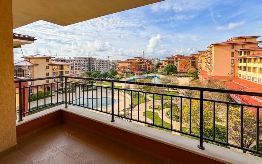 Balcony view of colorful Sveti Vlas buildings, close to the beach, ideal for vacation or investment.