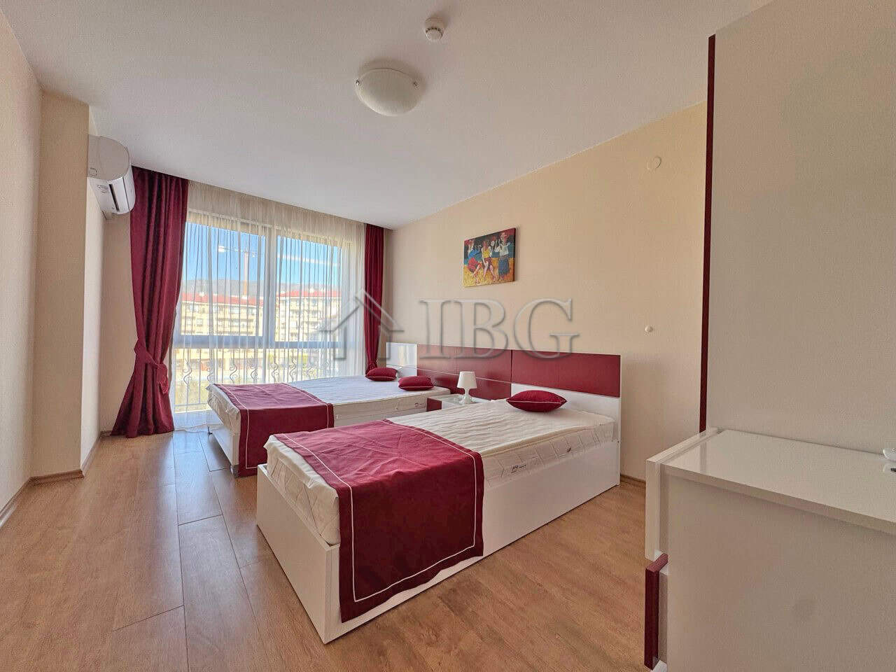 Apartment (1+1) for Sale | Premier Fort Beach, Sveti Vlas Apartment with sea view in Sveti Vlas, Bulgaria, featuring modern furnishings and balcony access.