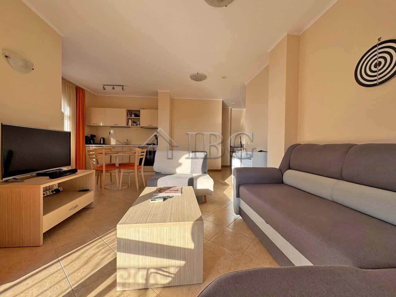 Modern living room in Sunny Beach apartment with stylish furniture and natural light.