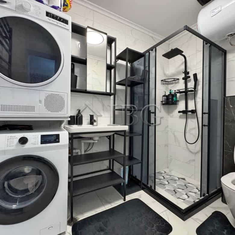 Bright, modern bathroom with shower in a spacious apartment.