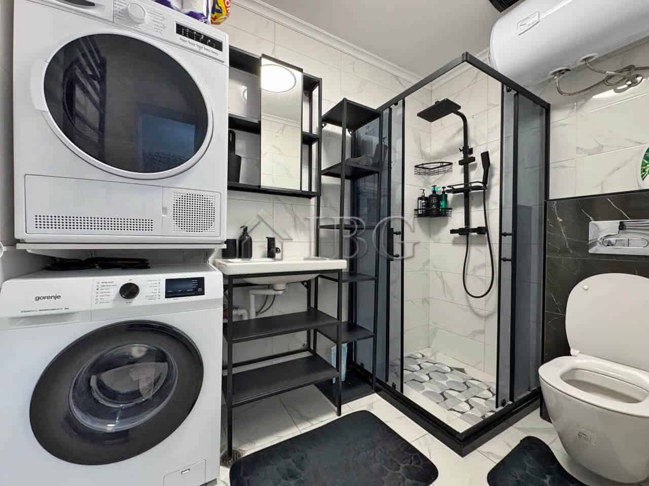 Bright, modern bathroom with shower in a spacious apartment.