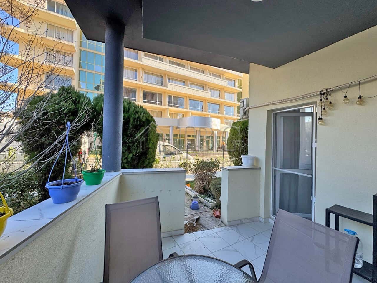 Bright apartment with large terrace in Sunny Beach, perfect for relaxing and enjoying outdoor views.