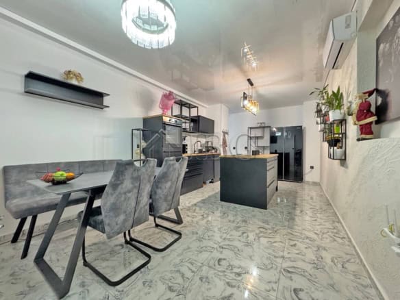 Bright three-room apartment featuring a generous terrace and modern interior design. Perfect for com.