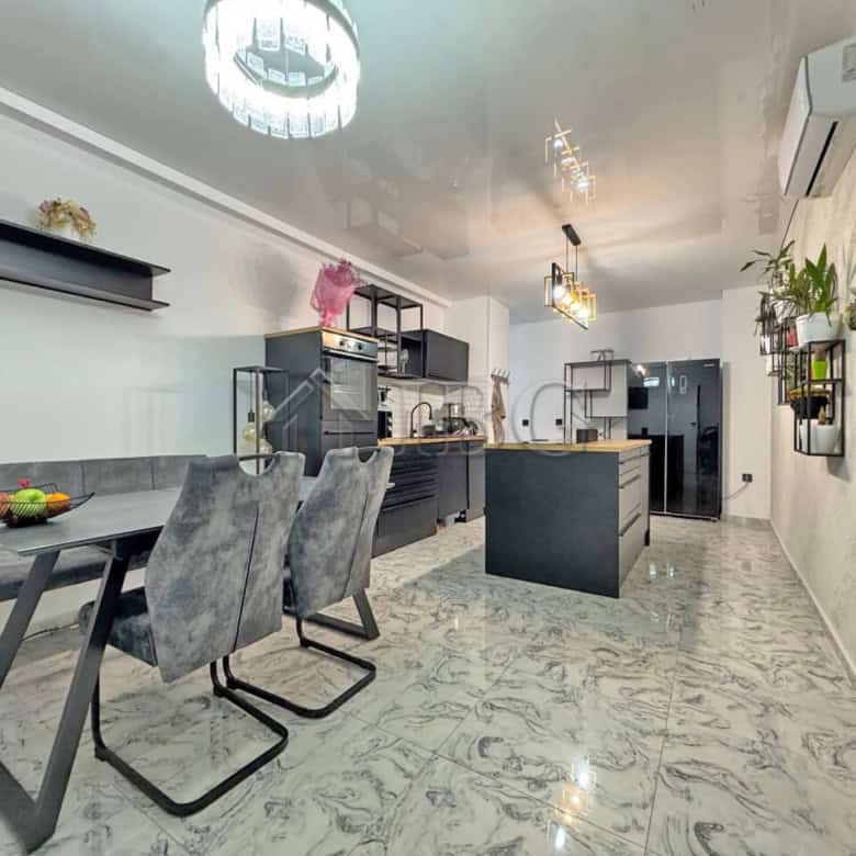 Bright three-room apartment featuring a generous terrace and modern interior design. Perfect for com.