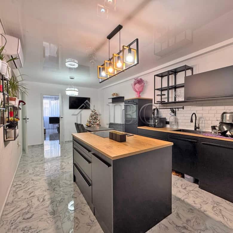 Stylish three-room apartment with large terrace in Sunny Beach, perfect for comfortable living.