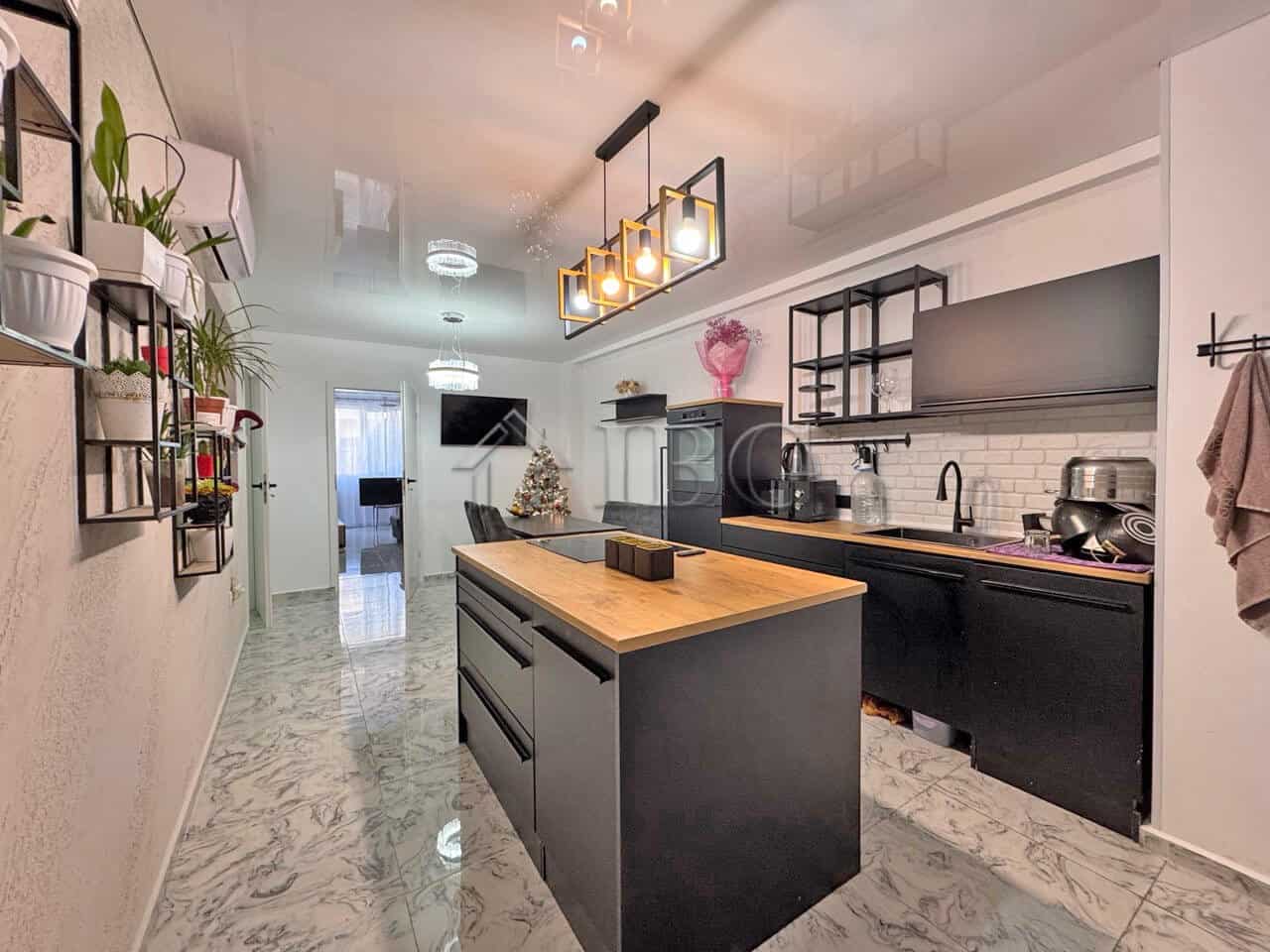 Stylish three-room apartment with large terrace in Sunny Beach, perfect for comfortable living.