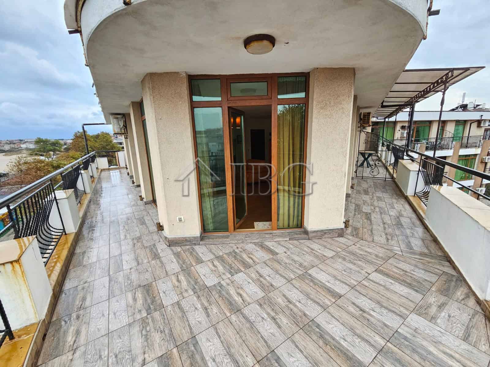 Balcony of a 2-bedroom, 2-bathroom apartment in Sozopol with panoramic sea views and spacious outdoo.