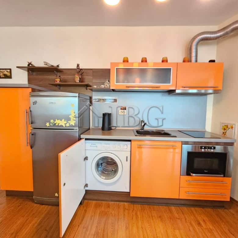 Cozy 2-bedroom apartment in Sozopol with sea view, modern kitchen, and essential appliances.