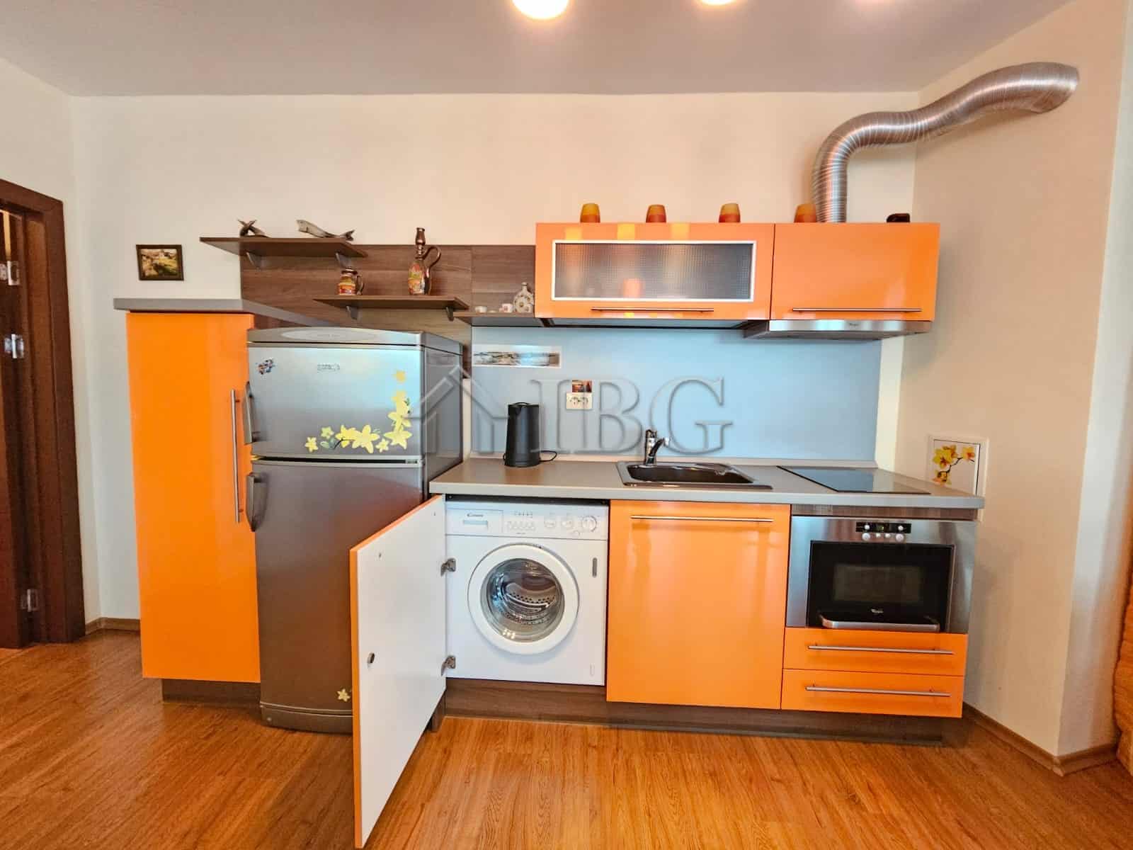 Cozy 2-bedroom apartment in Sozopol with sea view, modern kitchen, and essential appliances.