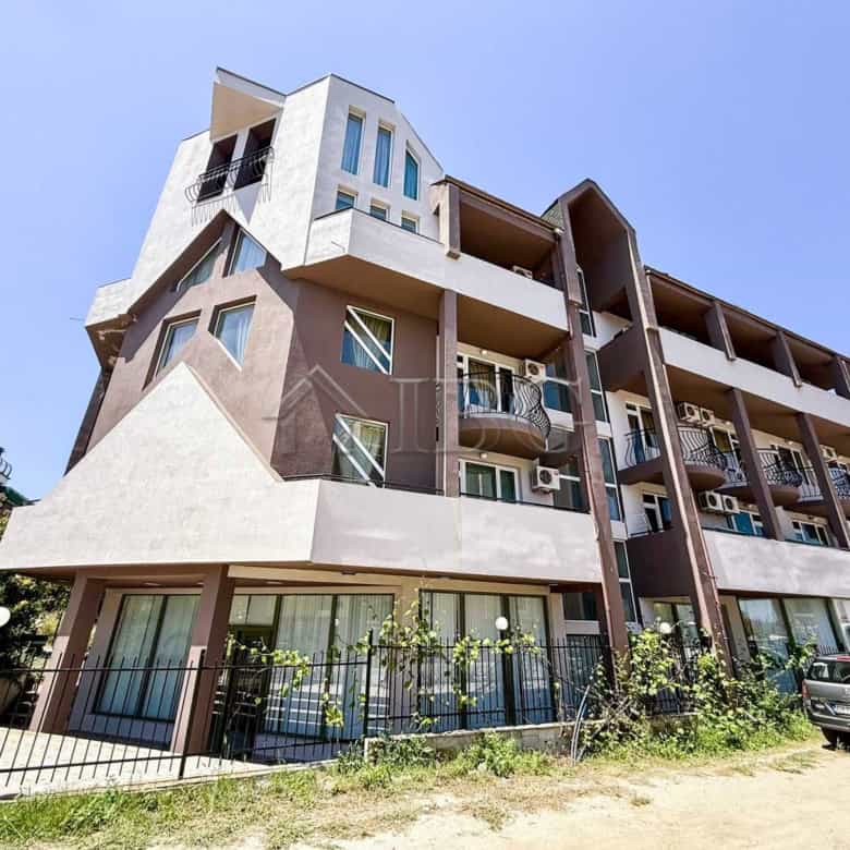 Contemporary apartment building in Ravda with storage and outdoor spaces.