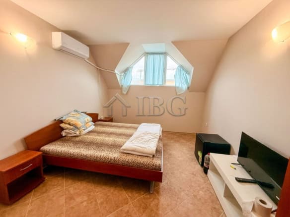 Compact studio with storage space and essential household utilities in Summer Ravda.