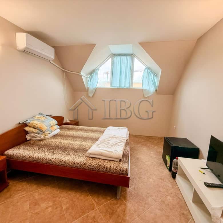 Compact studio with storage space and essential household utilities in Summer Ravda.