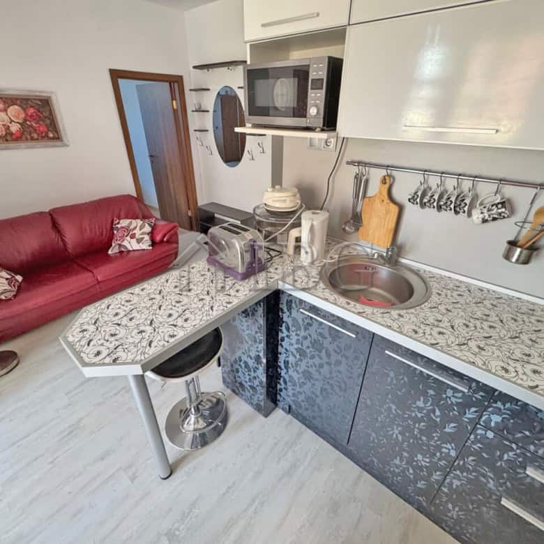 Modern kitchen and living area in a ground-floor apartment at Sunny Day 6, Sunny Beach. Perfect for.