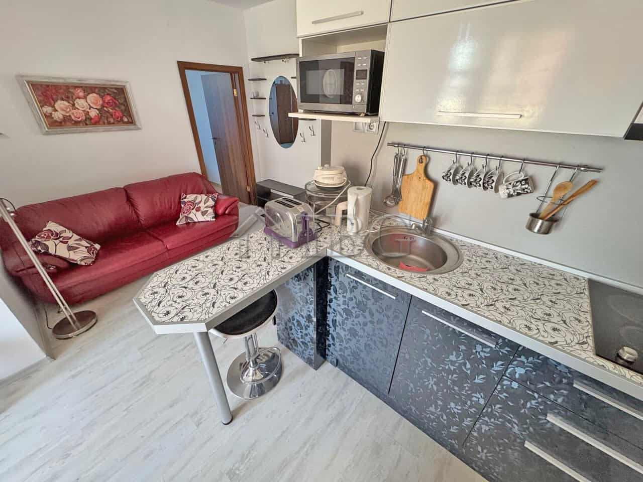 Modern kitchen and living area in a ground-floor apartment at Sunny Day 6, Sunny Beach. Perfect for.