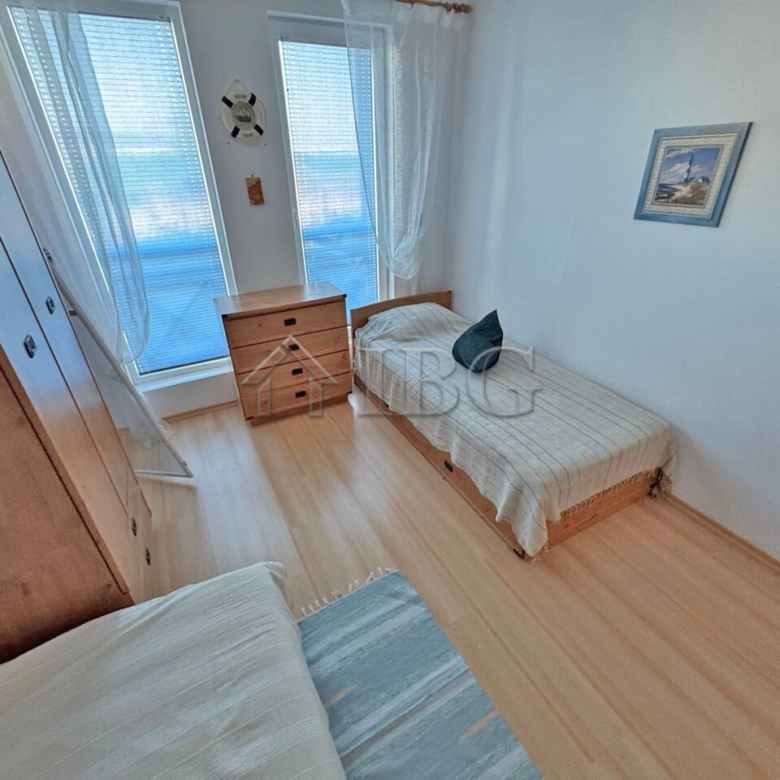 Cozy ground-floor apartment with two bedrooms, bright living space, and sea views in Sunny Beach.