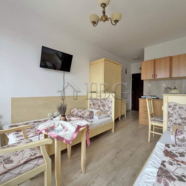 Furnished studio apartment with modern decor, located in Sunny Beach, perfect for short-term stays.
